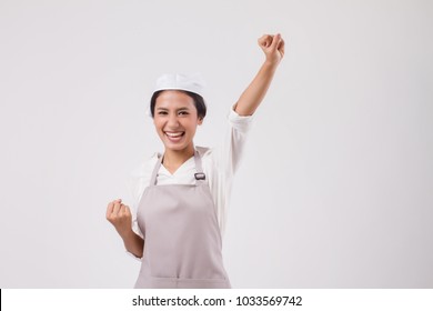 happy laughing excited successful professional asian woman domestic worker looking up, woman pro housekeeper success, girl shopkeeper looking, excited housewife, girl cleaner, woman maid looking up - Powered by Shutterstock