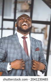 Happy Laughing Rich African American Businessman. Successful Media Tycoon In Stylish Expensive Suit. Concept Of Rich Life, Successful. High quality photo - Shutterstock ID 2041230485