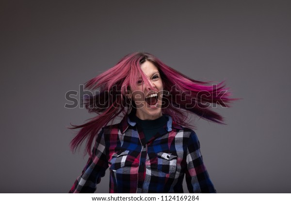 Happy Laughing Woman Flicking Her Purple Stock Photo Edit Now