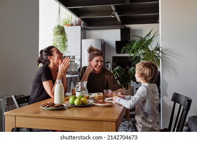 Happy Lesbian Family Talking To Child