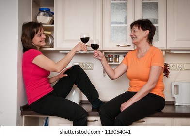 Happy Life - Mother And Daughter Drinking Wine