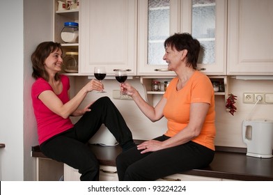 Happy Life - Mother And Daughter Drinking Wine