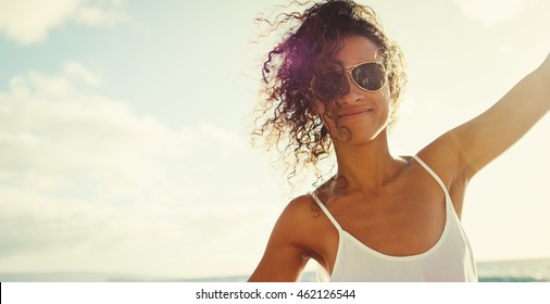 Happy lifestyle portrait of beautiful mixed race young woman