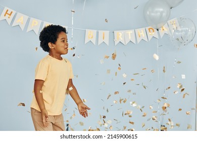 Happy Little African American Kid Have Fun Indoors At Birthday Party.