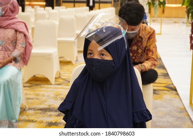 Happy Little Asian Child Wearing Black Mask. Palembang South Sumatera Indonesia On October 11, 2020.