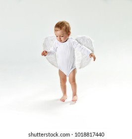 Happy little baby with angel wings