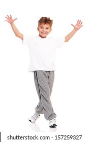 Happy little boy dancing isolated on white background