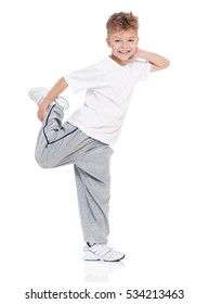 Happy Little Boy Dancing Isolated On White Background. Young Handsome Fresh Child Breakdancing. Dancer Kid Performing Extreme Break Dance Movements. 