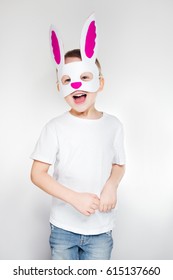 Happy Little Boy Dressed Up In Animal Mask For Easter