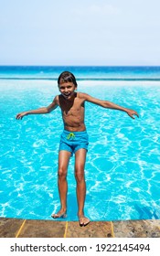 Happy Little Boy Have Fun Falling Backwards Into Swimming Pool Laughing