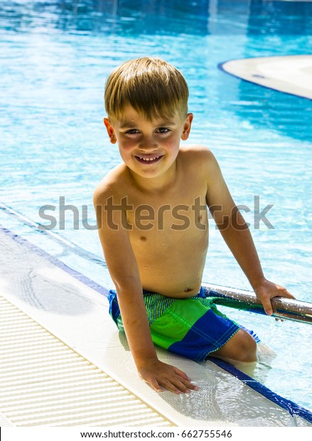 Happy Little Boy Sitting Near Swimming Stock Photo 662755546 | Shutterstock