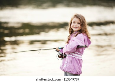 Happy Little Child Fishing