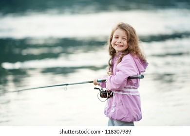 Happy Little Child Fishing