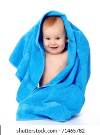 Happy Little Child Wrapped In Blue Towel, Isolated Over White