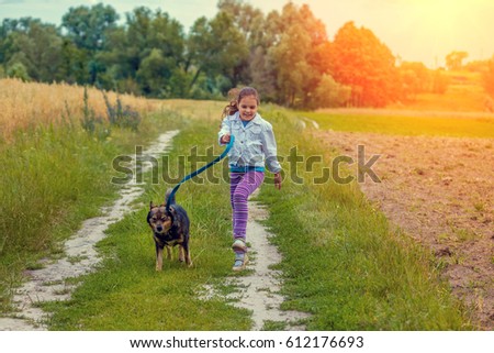 Similar – Attractive smiling blond woman with her two dogs