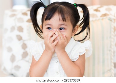 Happy Little Girl With Hand Cover Her Mouth