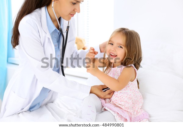 Happy Little Girl Health Exam Doctors Stock Photo Edit Now