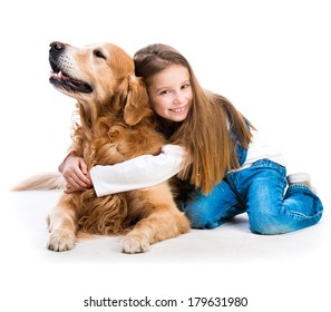 Happy Little Girl With Her Dog Golden Retriever In The Studio. Isolated On White Background