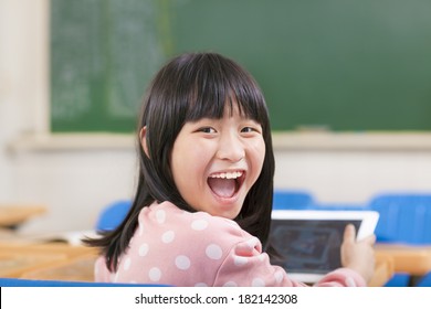 Happy Little Girl Holding Digital Tablet Ipad