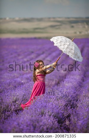 Similar – Woman posing in flower field with a handkerchief