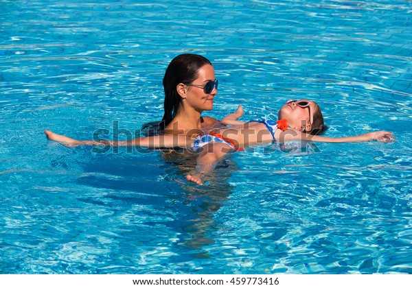 Swimming Pool Lesbians Kissing