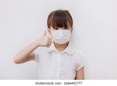 Happy Little Girl Wear Facemask Protect Virus And PM 2.5 Go To School. Portrait. 