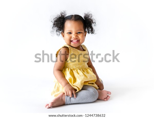 happy-little-girl-yellow-dress-600w-1244