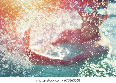 Happy Little Kid Splashing In Water, Summer Concept