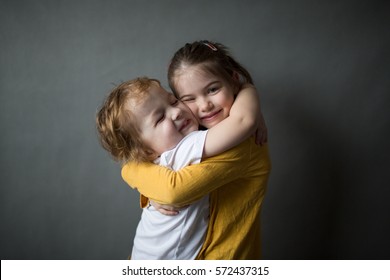 Happy Little Kids Hugging Each Other