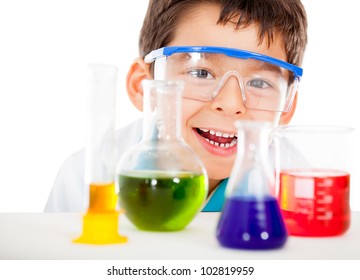 Happy little scientist playing at the lab - isolated over a white background - Powered by Shutterstock