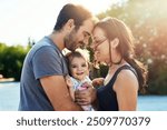 Happy, love and parents with baby in park for bonding, loving relationship and relax together outdoors. Family, sunshine and mom, dad and child for embrace, affection and forehead touch on weekend