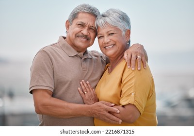 Happy, love and portrait of a senior couple in retirement, bonding and embracing in nature. Happiness, smile and elderly man and woman from Puerto Rico hugging with care, romance and joy outdoors. - Powered by Shutterstock