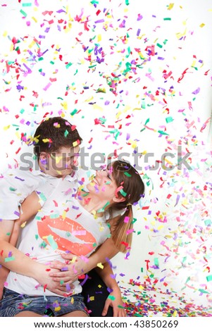 Similar – Young couple celebrating a party with their dog