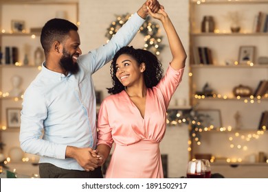 Happy Loving Family. Portrait Of Beautiful Young African American Couple In Love Dancing And Looking At Each Other. Smiling Black Bearded Man Having Fun With His Pretty Excited Woman