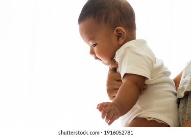 Happy loving family.Mother and her child baby boy walk playing