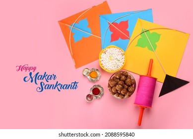 Happy Makar Sankranti greeting card using Sweet Sesame or Tilgul Laddu in a bowl with haldi Kumkum, Kites and spool