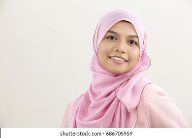 Happy Malay Woman With Tudung Looking At Camera