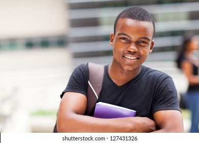 happy male african university student outdoors