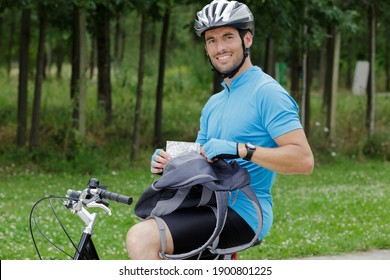 happy male cyclist in forest - Powered by Shutterstock