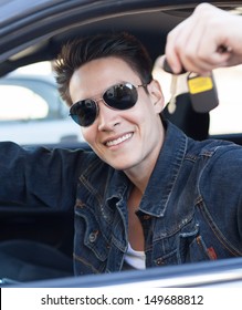 Happy Male Driver Smiling Showing New Car Keys