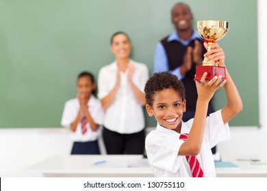 Elementary School Teacher Helping Student Classroom Stock Photo ...