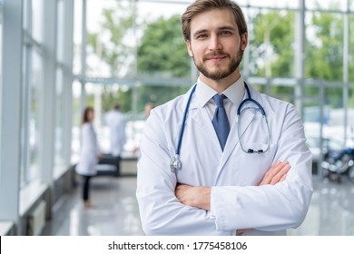 Happy Male Medical Doctor Portrait In Hospital