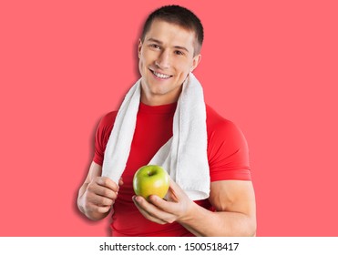 Happy Male Runner Smiles Broadly, Surprised To Cover Long Distance On Marathon, Has Towel On Neck, Wears Casual T Shirt And White Headband, Isolated Over Purple Background. Sport And Training Concept