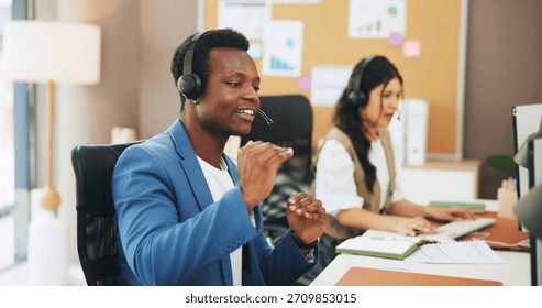 Happy man, agent or computer with headset in office for online advice or virtual assistance. Businessman, employee or consultant with smile, mic or technology for CRM communication, help or support