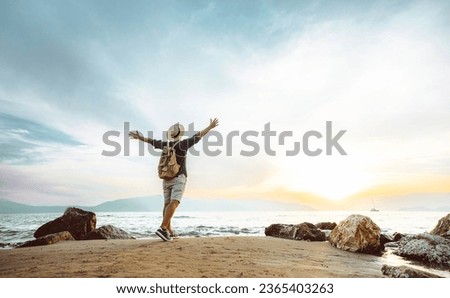 Similar – Image, Stock Photo Traveling with backpack concept image. Backpacker female in trekking boots crossing mountain river. Summer vacation trip