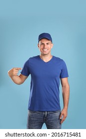 Happy Man In Cap And Tshirt On Light Blue Background. Mockup For Design