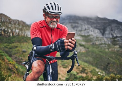 Happy man, cyclist and phone on mountain bicycle in communication, social media or networking in nature. Male person or athlete smile on mobile smartphone app in sports workout, fitness or cycling - Powered by Shutterstock