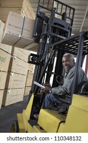 Happy Man Driving Forklift