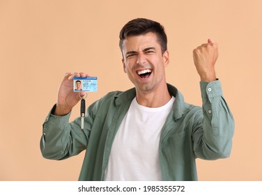 Happy man with driving license on color background