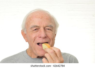 Happy Man Eats Slice Apple Stock Photo 42642784 Shutterstock